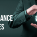 Businessman in a suit frames a glowing car icon with his hands beside bold text reading CAR INSURANCE QUOTES.
